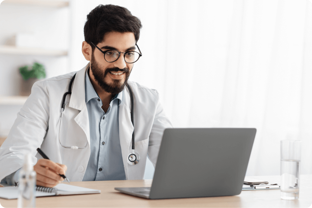 Doctor using laptop