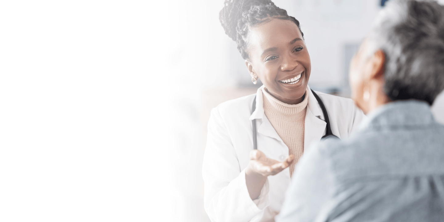 doctor speaking with patient