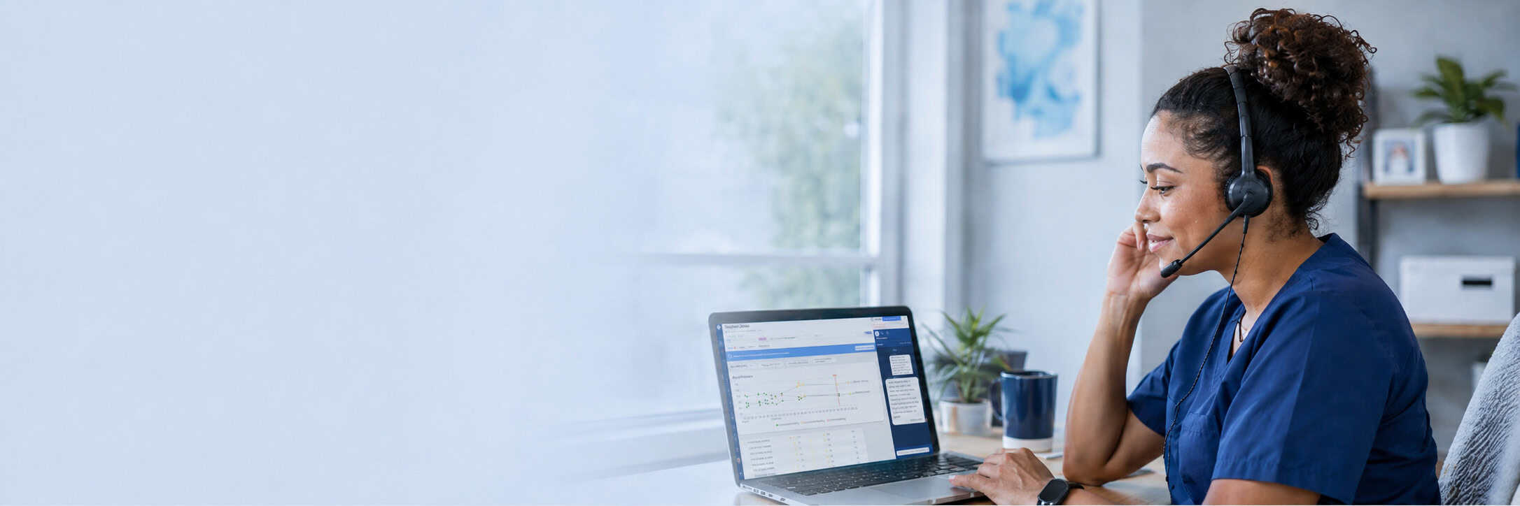 Vivo Care care navigator in scrubs and headset reviewing a patient's remote monitoring dashboard on a laptop