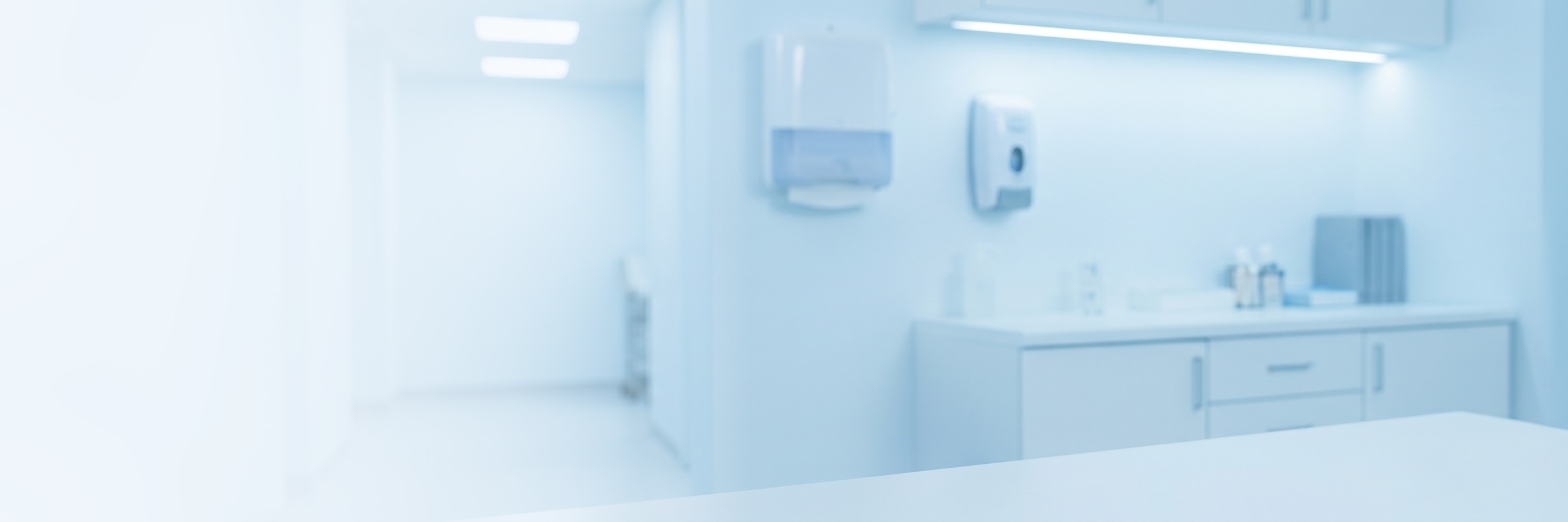 FQHC clinical team reviewing remote patient monitoring data on a connected device dashboard