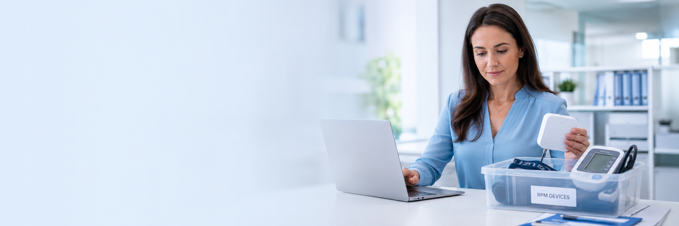 Practice administrator organizing remote patient monitoring devices while planning an RPM vendor switch